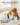 7-in-1 pet grooming vacuum kit being used on a golden retriever