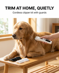 White cordless pet clipper being used to groom a dog at home