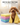 Four folded super absorbent pet towels beside a dog after a bath